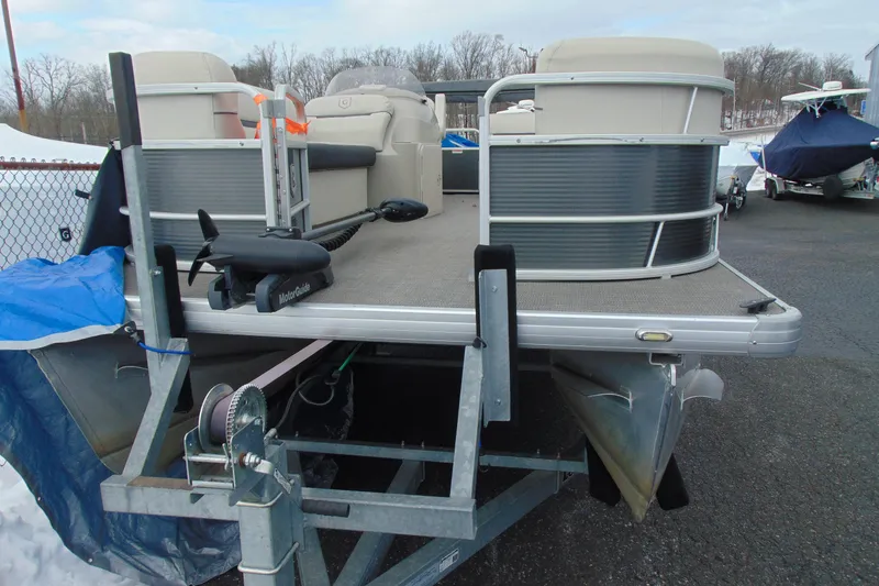 Slide: The Image of 2019 Godfrey SW 180C pontoon boat on trailer, parked outdoors. - 6