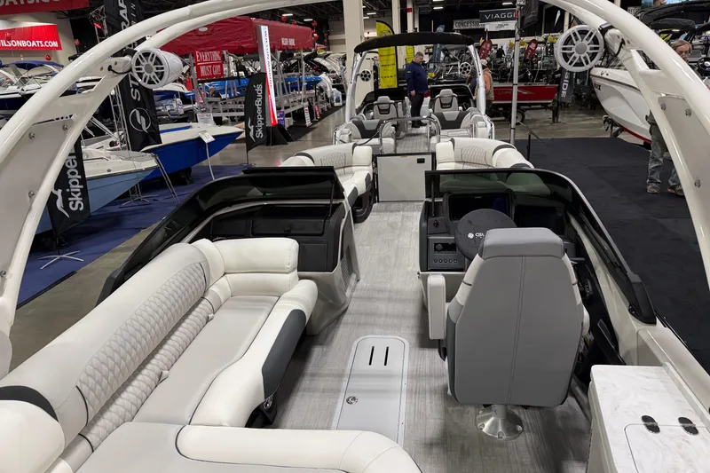 Slide: The Image of Luxurious 2026 Avalon 2785 27-3 Excalibur LTD VRBW pontoon boat interior at a boat show. - 3