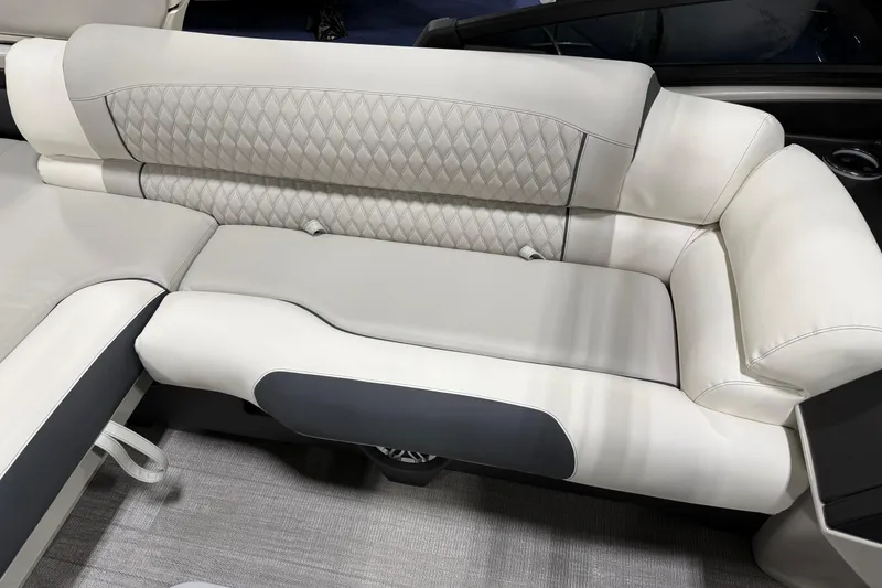 Slide: The Image of Luxurious seating in 2026 Avalon 2785 27-3 Excalibur LTD VRBW boat, featuring diamond-pattern upholstery. - 7