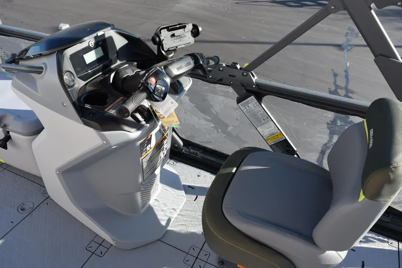 Slide: The Image of 2026 Sea-Doo Switch Fish 21 dashboard and seating area, featuring modern controls and comfortable seating. - 13