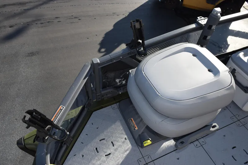 Slide: The Image of 2026 Sea-Doo Switch Fish 21 boat interior with seating and rod holders. - 6