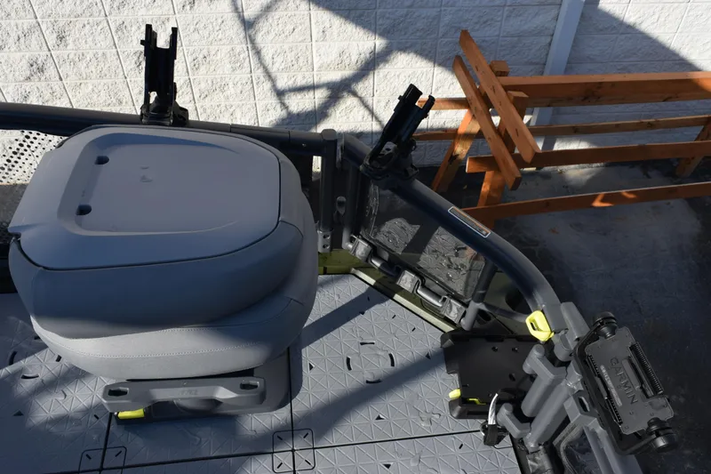 Slide: The Image of 2026 Sea-Doo Switch Fish 21 boat interior with seating and equipment holders. - 7