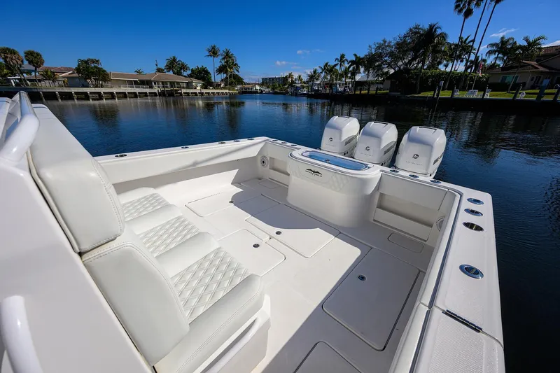 Slide: The Image of 2021 Invincible 39 Open Fisherman boat with spacious deck and triple engines. - 49