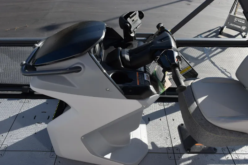 Slide: The Image of 2026 Sea-Doo Switch Cruise 21 helm with steering controls and seat. - 10