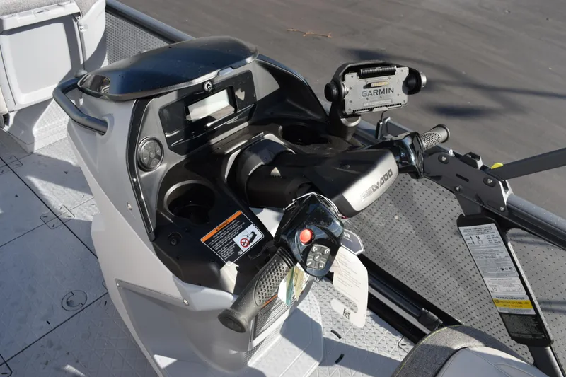 Slide: The Image of 2026 Sea-Doo Switch Cruise 21 dashboard with Garmin navigation system and controls. - 11