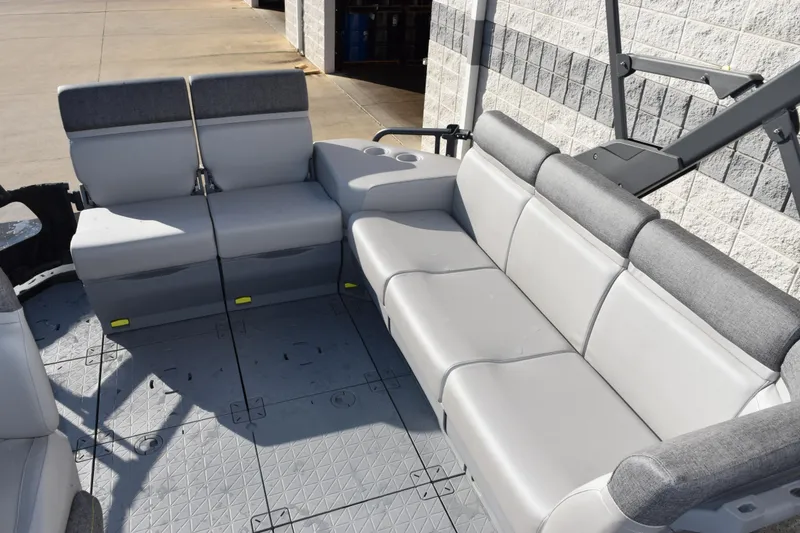 Slide: The Image of 2026 Sea-Doo Switch Cruise 21 interior with gray seating and spacious layout. - 9