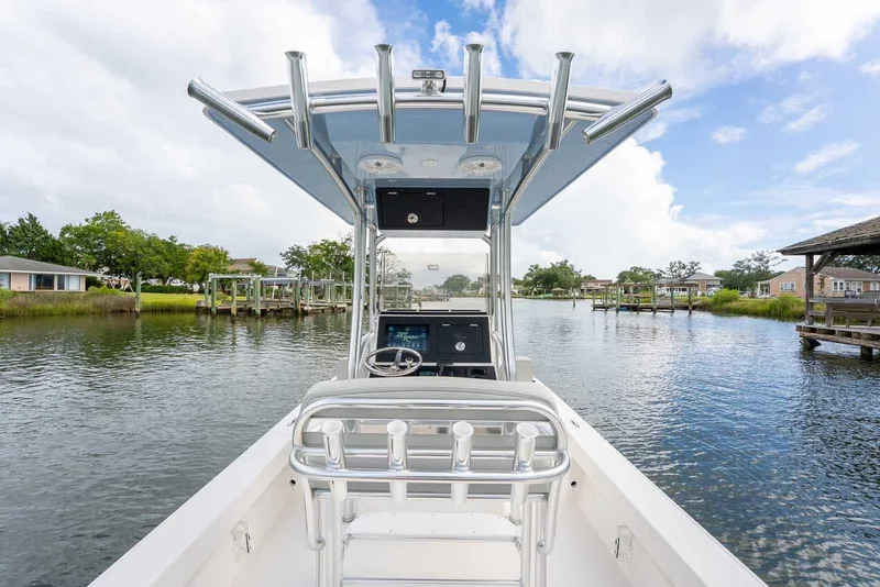 Slide: The Image of Manufacturer Provided Image: 2025 Bay Rider 219 Bay boat on a scenic waterway with clear skies. - 20