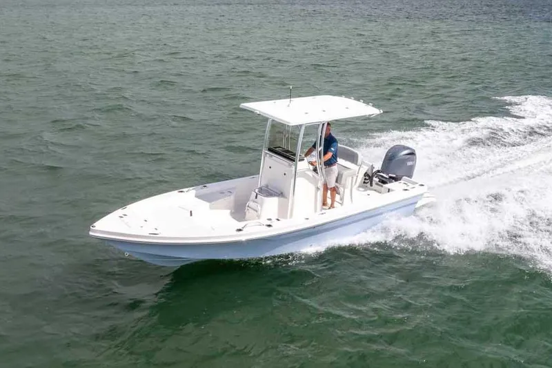 Slide: The Image of Manufacturer Provided Image: 2025 Bay Rider 219 Bay boat cruising on open water, showcasing sleek design and performance. - 3