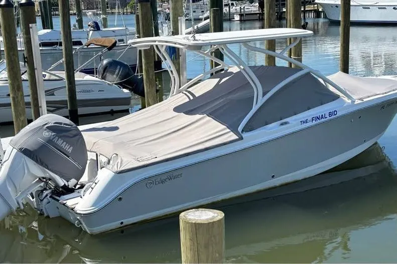 The Image of 2023 Edgewater 248CX Crossover boat on open water, featuring sleek design and modern amenities. - 0