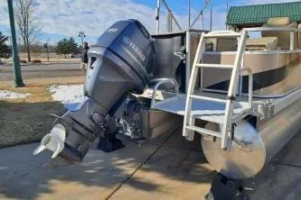 The Image of 2014 BENNIGTON S21 boat with Yamaha outboard motor on a sunny day. - 1