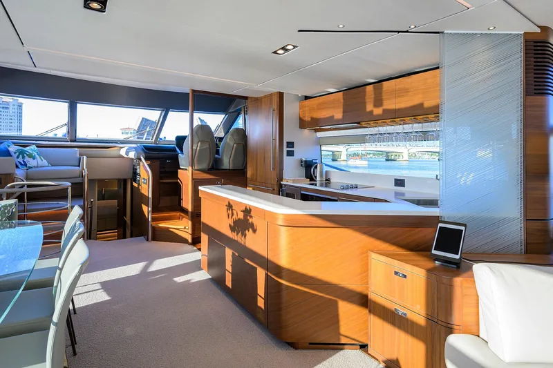 Slide: The Image of Luxurious interior of 2021 Princess Y78 yacht with modern kitchen and seating area. - 10