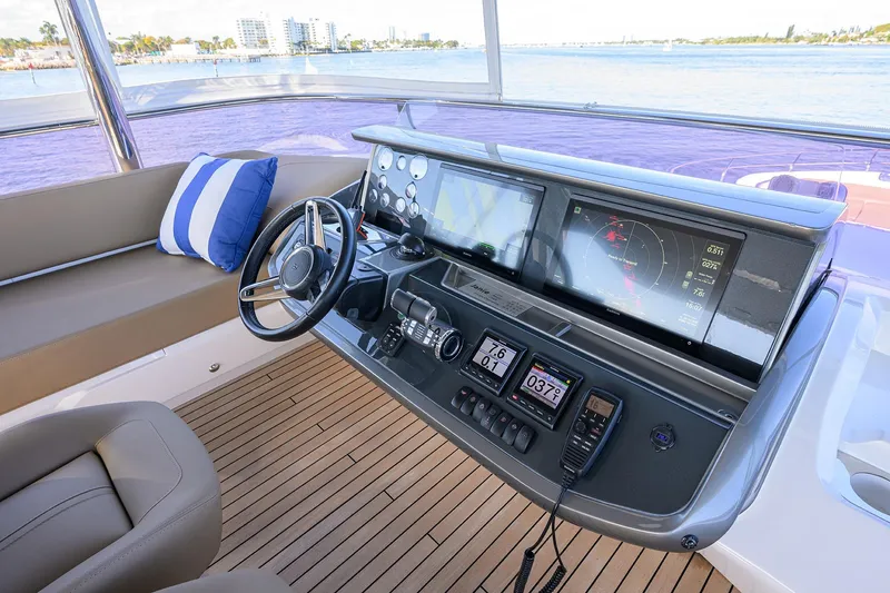 Slide: The Image of Helm of 2021 Princess Y78 yacht with advanced navigation systems and luxurious seating. - 13