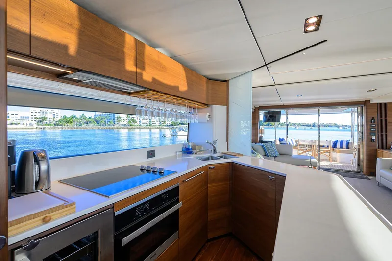 Slide: The Image of Luxurious interior of 2021 Princess Y78 yacht with modern kitchen and scenic ocean view. - 14