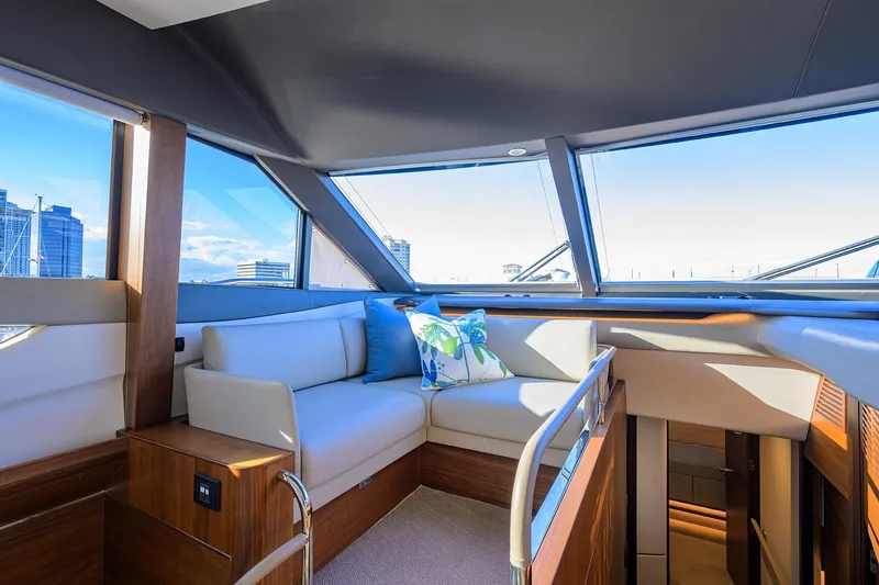 Slide: The Image of Luxurious interior of 2021 Princess Y78 yacht with modern seating and panoramic windows. - 19