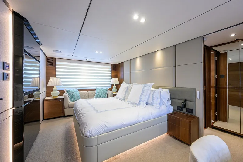 Slide: The Image of Luxurious bedroom interior of 2021 Princess Y78 yacht, featuring elegant decor and modern amenities. - 20