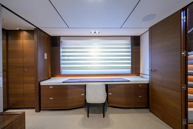 Slide: The Image of Luxurious interior of 2021 Princess Y78 yacht with elegant wood finishes and modern design. - 23