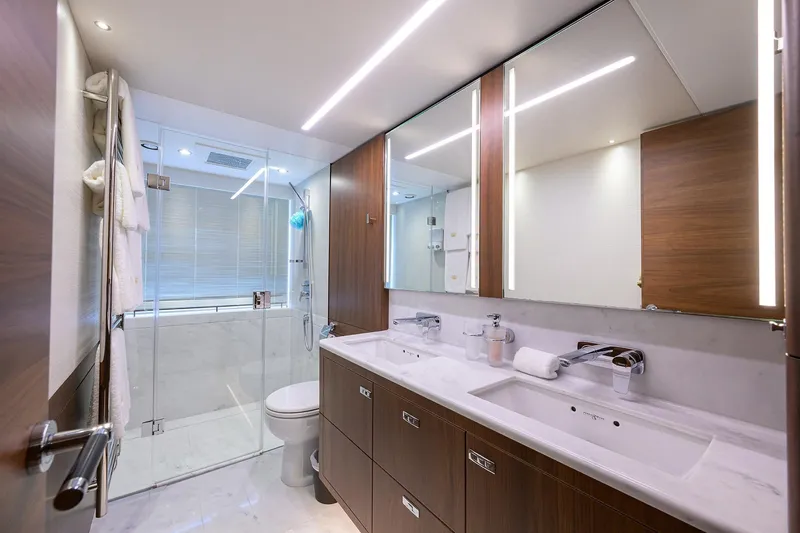 Slide: The Image of Luxurious bathroom in 2021 Princess Y78 yacht with modern fixtures and elegant design. - 25