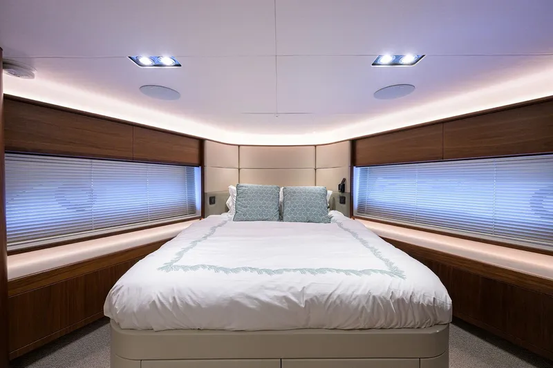 Slide: The Image of Luxurious bedroom interior of 2021 Princess Y78 yacht with elegant lighting and modern design. - 27