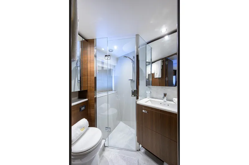 Slide: The Image of Luxurious bathroom in 2021 Princess Y78 yacht with modern fixtures and elegant wood accents. - 30