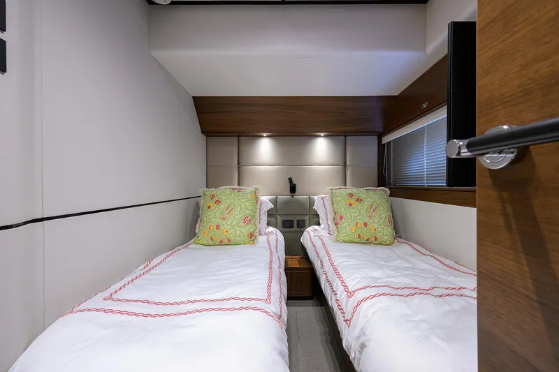 Slide: The Image of Luxurious twin cabin interior of 2021 Princess Y78 yacht with elegant bedding and decor. - 33