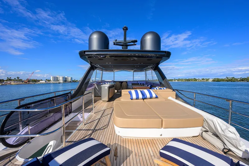 Slide: The Image of Luxurious 2021 Princess Y78 yacht deck with sun loungers and ocean view. - 4