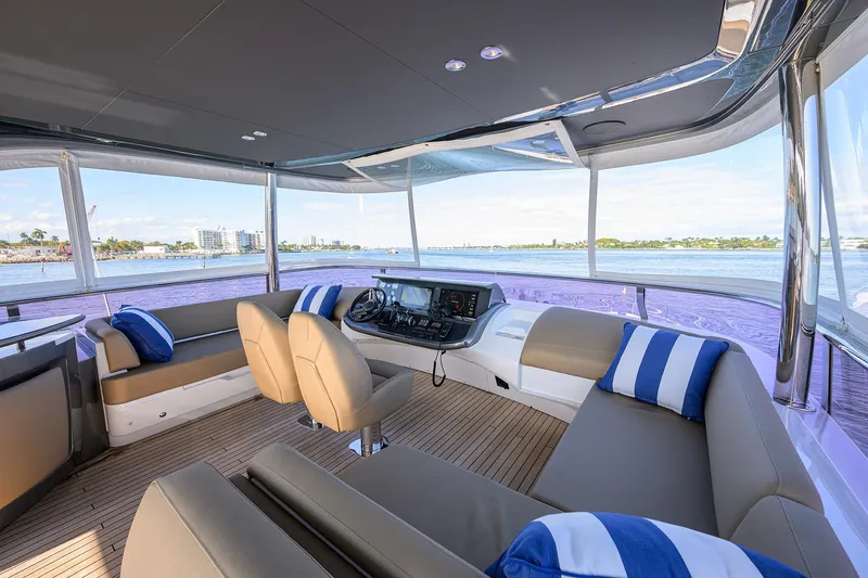 Slide: The Image of Luxurious 2021 Princess Y78 yacht interior with plush seating and scenic ocean view. - 46