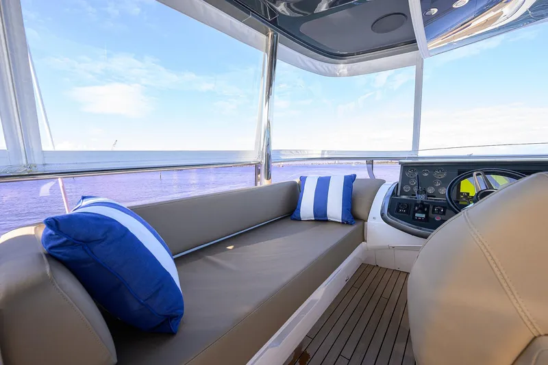 Slide: The Image of Luxurious interior of 2021 Princess Y78 yacht with plush seating and ocean view. - 48