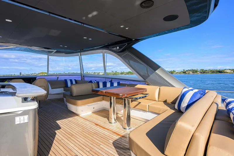 Slide: The Image of Luxurious 2021 Princess Y78 yacht interior with elegant seating and scenic ocean view. - 58