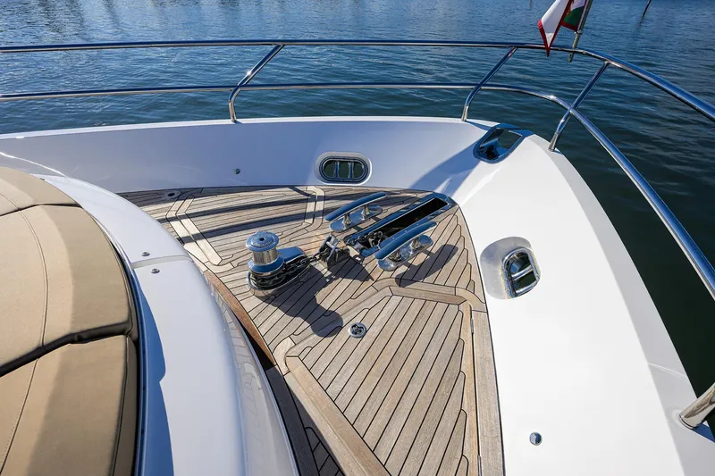 Slide: The Image of Bow deck of 2021 Princess Y78 yacht with teak flooring and stainless steel fittings. - 70