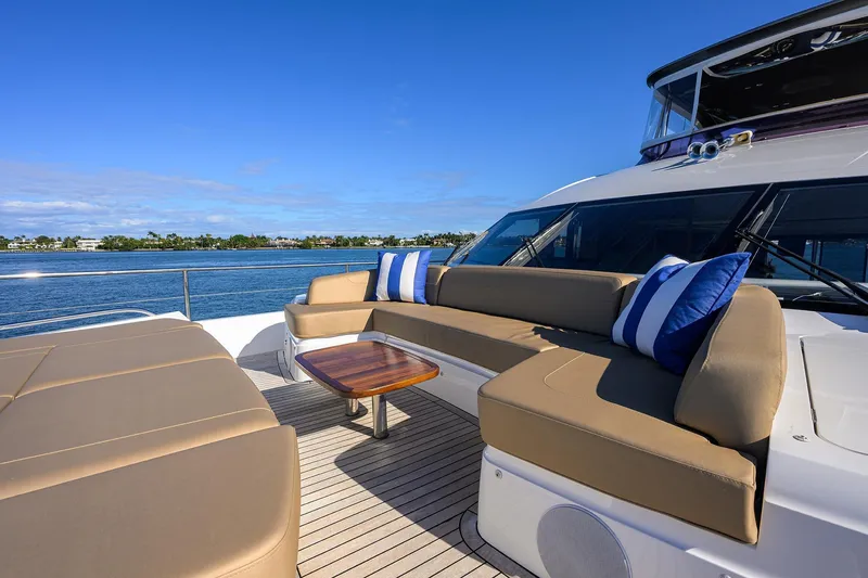 Slide: The Image of Luxurious 2021 Princess Y78 yacht deck with comfortable seating and ocean view. - 72