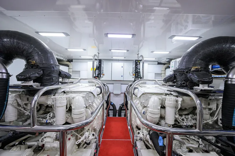 Slide: The Image of Engine room of 2021 Princess Y78 yacht, featuring dual engines and modern equipment. - 76