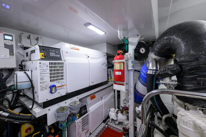 Slide: The Image of Engine room of 2021 Princess Y78 yacht with generator and fire extinguisher. - 82