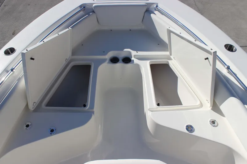 Slide: The Image of 2026 Key West 219 FS boat interior with open storage compartments. - 14