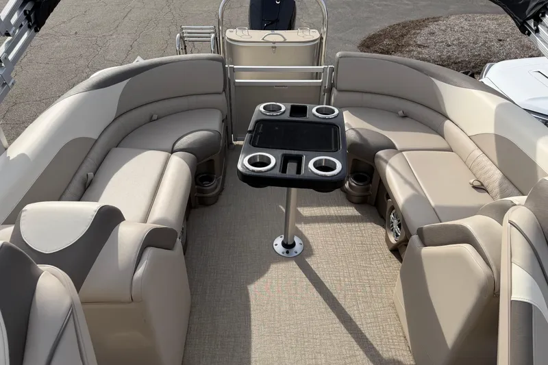 Slide: The Image of 2023 Avalon LSZ QUAD LOUNGE interior with plush seating and central table. - 2