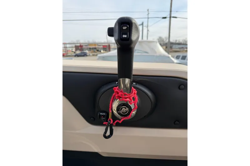 Slide: The Image of Throttle control of 2023 Avalon LSZ QUAD LOUNGE boat with red safety lanyard. - 20