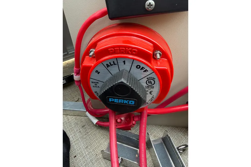 Slide: The Image of Red Perko marine battery switch on 2023 Avalon LSZ QUAD LOUNGE boat. - 4