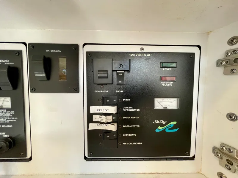 Slide: The Image of Electrical control panel of 2001 Sea Ray Sundancer 310. - 26