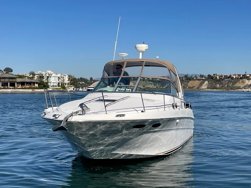 Slide: The Image of 2001 Sea Ray Sundancer 310 on calm waters. - 3