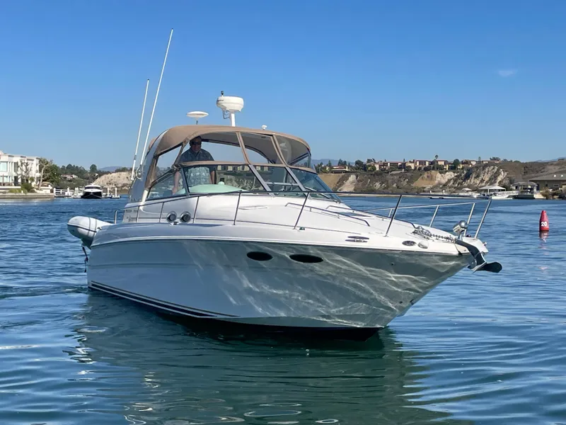 Slide: The Image of 2001 Sea Ray Sundancer 310 on calm waters. - 4