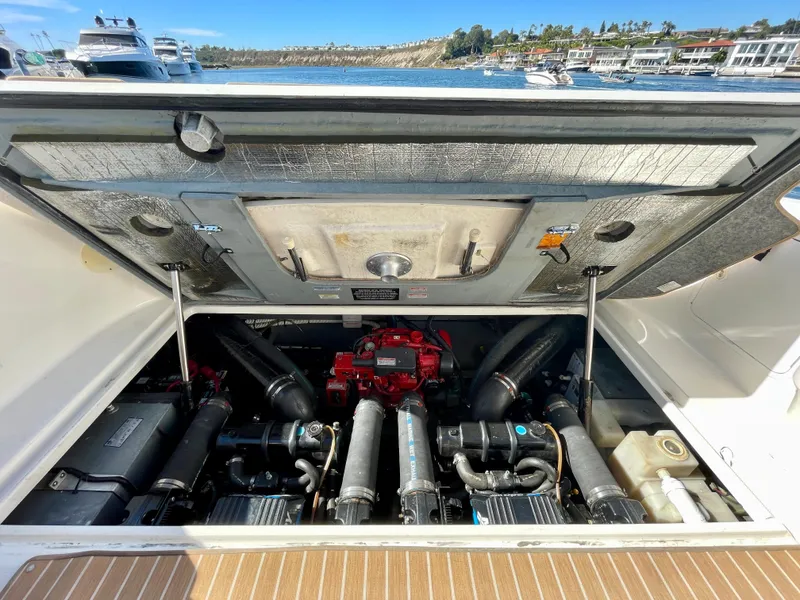 Slide: The Image of Engine compartment of 2001 Sea Ray Sundancer 310 with open hatch. - 47