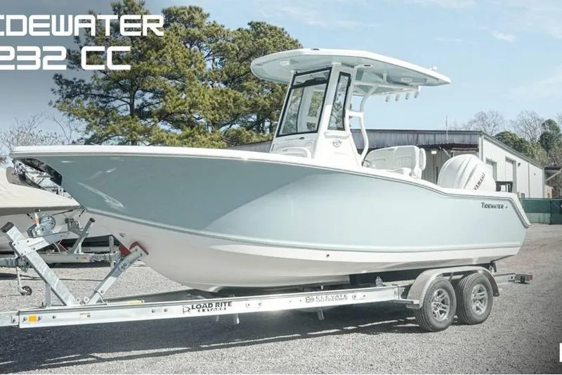 The Image of 2026 Tidewater 232 CC Adventure boat on trailer, parked outdoors. - 0
