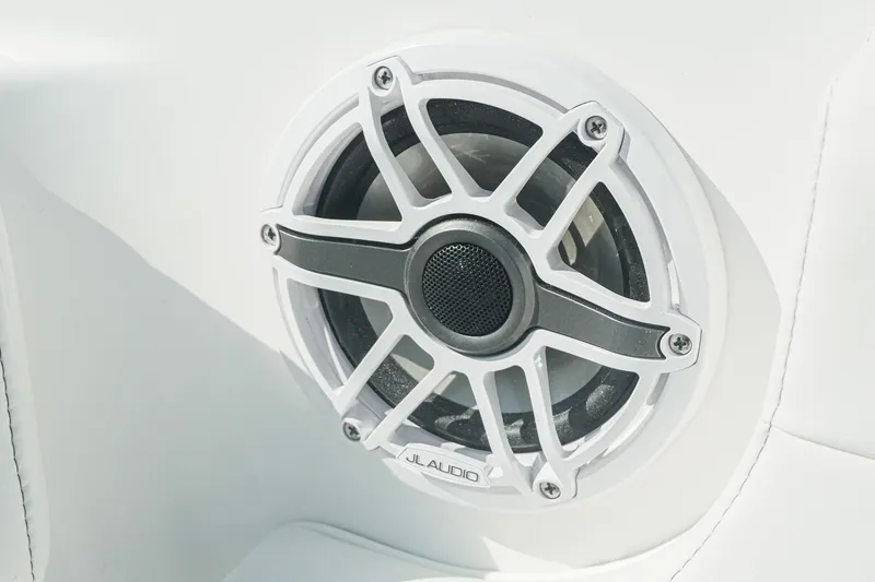 Slide: The Image of Speaker detail on 2026 Tidewater 232 CC Adventure boat, featuring JL Audio system. - 20