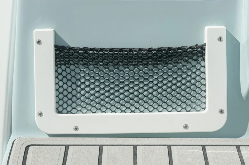 Slide: The Image of 2026 Tidewater 232 CC Adventure boat storage net detail. - 23