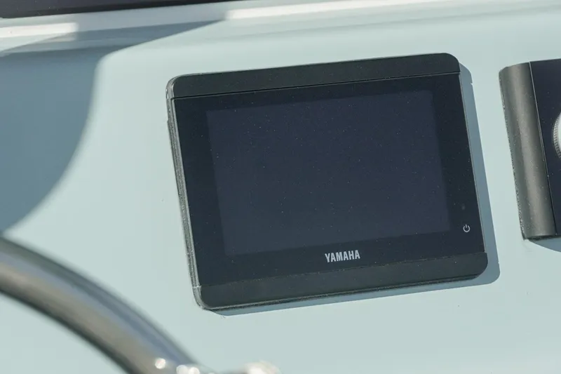 Slide: The Image of Yamaha display on 2026 Tidewater 232 CC Adventure boat dashboard. - 24