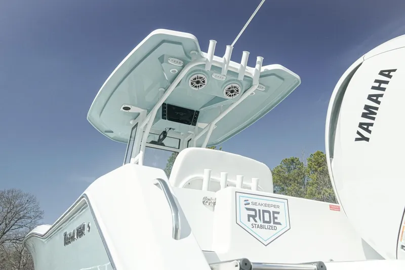 Slide: The Image of 2026 Tidewater 232 CC Adventure boat with Yamaha engine and Seakeeper Ride stabilization. - 34