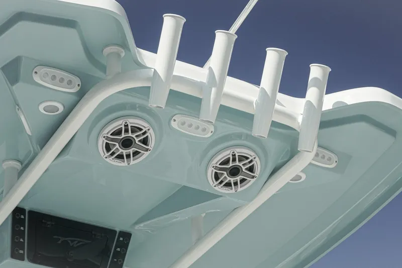 Slide: The Image of 2026 Tidewater 232 CC Adventure boat with speakers and rod holders, viewed from below. - 35