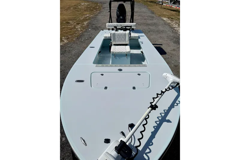 Slide: The Image of 2022 Beavertail Skiffs Vengeance 18 boat with sleek design and modern features. - 13