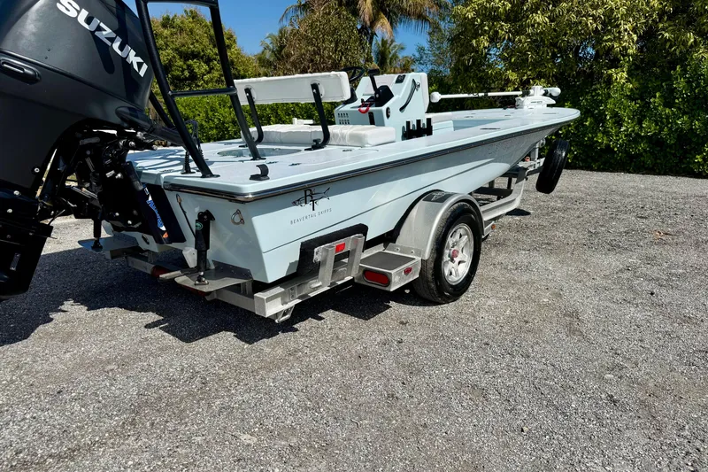 Slide: The Image of 2022 Beavertail Skiffs Vengeance 18 on trailer with Suzuki outboard motor. - 26