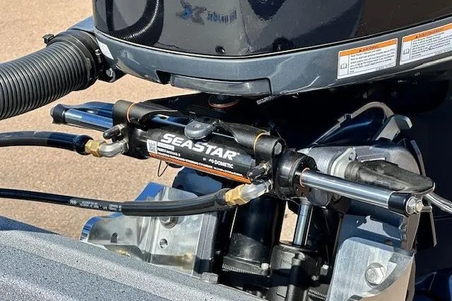 Slide: The Image of Hydraulic steering system on Express H20C 2026 boat, featuring SeaStar components. - 10