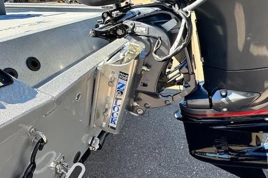 Slide: The Image of Boat motor mount on 2026 Express H20C, featuring secure locking mechanism. - 9